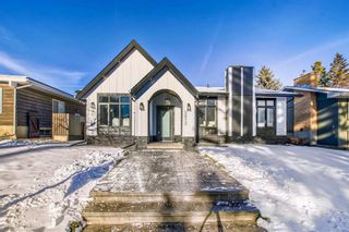 Photo 1: 5612 Lodge Crescent SW in Calgary: Lakeview Detached for sale : MLS®# A2097671