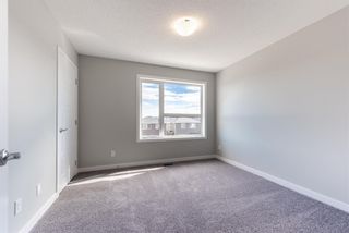 Photo 19: 123 301 REDSTONE Boulevard in Calgary: Redstone Row/Townhouse for sale : MLS®# A1246264