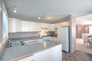 Photo 13: 297 Arbour Cliff Close NW in Calgary: Arbour Lake Semi Detached (Half Duplex) for sale : MLS®# A1255400