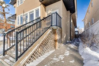 Photo 2: 140 29 Avenue NW in Calgary: Tuxedo Park Row/Townhouse for sale : MLS®# A1067280
