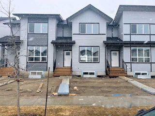 Photo 1: 32 Lake Street: Rural Red Deer County Row/Townhouse for sale : MLS®# A2120383