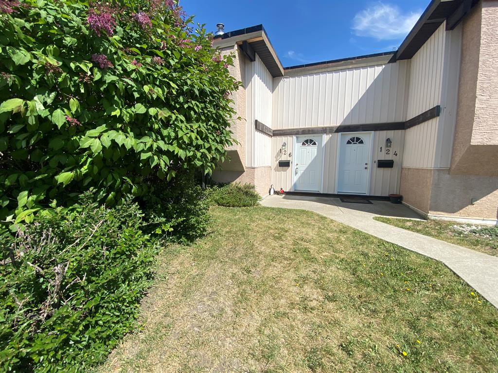 Main Photo: 126 Oaktree Lane SW in Calgary: Oakridge Semi Detached (Half Duplex) for sale : MLS®# A2055027