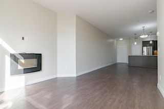 Photo 10: 212 28 Auburn Bay Link SE in Calgary: Auburn Bay Apartment for sale : MLS®# A1250132