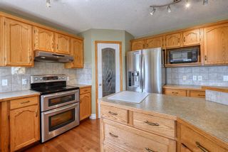 Photo 10: 104 Country Hills Park NW in Calgary: Country Hills Detached for sale : MLS®# A1232311