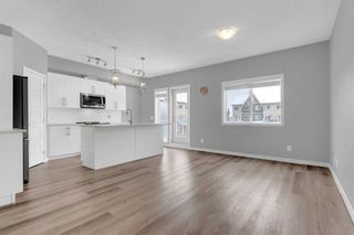 Photo 6: 708 32 Red Embers Parade NE in Calgary: Redstone Row/Townhouse for sale : MLS®# A2120864