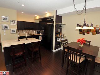 Photo 1: 307 20281 53A Avenue in Langley: Langley City Condo for sale in "CHILTON LAYNE" : MLS®# F1200099