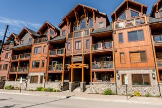 Photo 1: 404 707 Spring Creek Drive: Canmore Apartment for sale : MLS®# A1234698