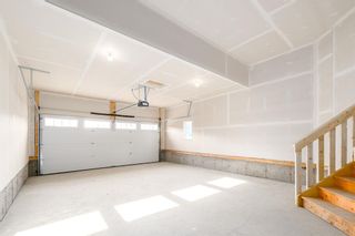 Photo 39: 102 Sundown Close: Cochrane Semi Detached (Half Duplex) for sale : MLS®# A2070990
