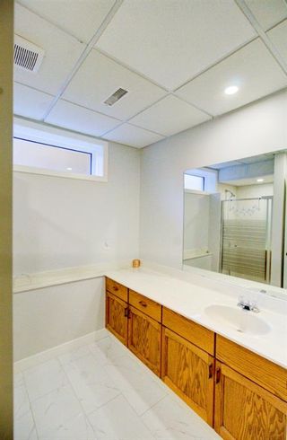 Photo 41: 50 Signature Close SW in Calgary: Signal Hill Detached for sale : MLS®# A1239511