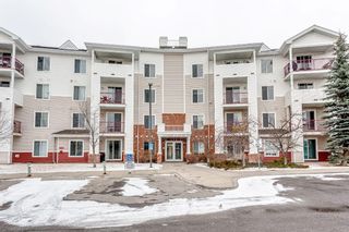 Photo 1: 310 9 Country Village Bay NE in Calgary: Country Hills Village Apartment for sale : MLS®# A1246167