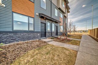 Photo 1: 405 Corner Glen Circle NE in Calgary: Cornerstone Row/Townhouse for sale : MLS®# A2125592