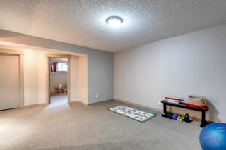 Photo 32: 119 Couture Crescent SW in Calgary: Garrison Green Row/Townhouse for sale : MLS®# A1197042