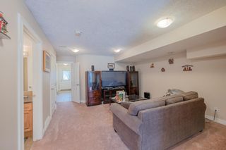Photo 9: 30 WEST CEDAR Rise SW in Calgary: West Springs Row/Townhouse for sale : MLS®# A1206372