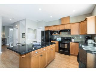 Photo 9: 7033 179A Street in Surrey: Cloverdale BC Condo for sale in "Provinceton" (Cloverdale)  : MLS®# R2392761