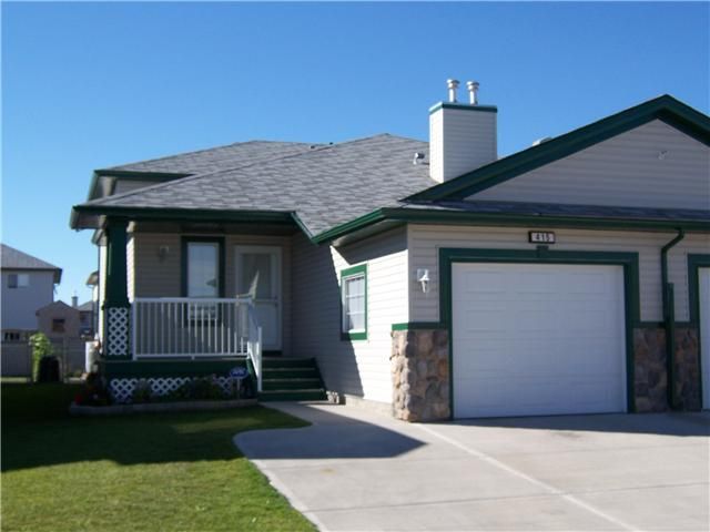Main Photo: 415 STONEGATE Rise NW: Airdrie Residential Attached for sale : MLS®# C3442625