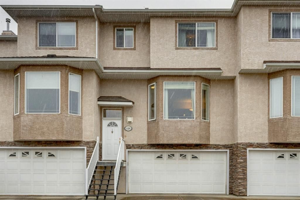 Main Photo: 128 Country Hills Gardens NW in Calgary: Country Hills Row/Townhouse for sale : MLS®# A1157775