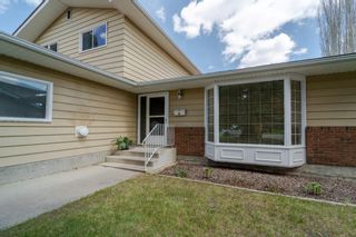 Photo 4: 220 Parkview Place SE in Calgary: Parkland Detached for sale : MLS®# A1210313