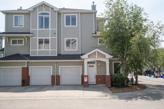 Main Photo: 202 8000 Wentworth Drive SW in Calgary: West Springs Row/Townhouse for sale : MLS®# A2054103