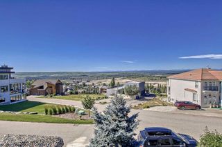 Photo 12: 86 Slopes Point SW in Calgary: Springbank Hill Detached for sale : MLS®# A2075999