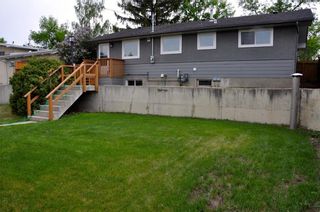 Photo 17: 7412 FARRELL Road SE in Calgary: Fairview Detached for sale : MLS®# A1161905