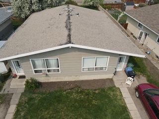 Photo 2: 204 and 204a Allan Crescent SE in Calgary: Acadia Full Duplex for sale : MLS®# A2051048