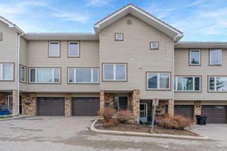 Photo 1: 10 Coachway Gardens SW in Calgary: Coach Hill Row/Townhouse for sale : MLS®# A2126800