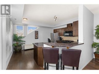 Photo 17: 1128 Sunset Drive Unit# 401 in Kelowna: House for sale : MLS®# 10306138