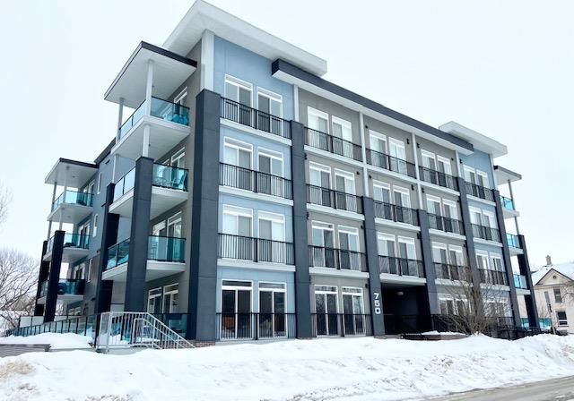 Photo 1: Photos: 104 750 Tache Avenue in Winnipeg: St Boniface Condominium for sale (2A)  : MLS®# 202207041