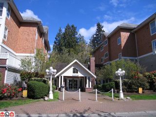 Photo 1: 319 9626 148TH Street in Surrey: Guildford Condo for sale in "HARTFORD WOODS" (North Surrey)  : MLS®# F1022380