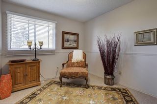 Photo 23: 7 Coach Manor Rise SW in Calgary: Coach Hill Detached for sale : MLS®# A2049271