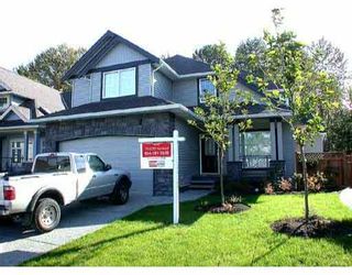 Photo 1: 3264 OSBORNE Street in Port_Coquitlam: Woodland Acres PQ House for sale (Port Coquitlam)  : MLS®# V755896