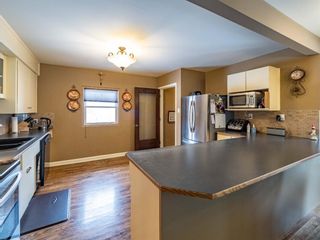 Photo 10: 105 Hudson Road NW in Calgary: Highwood Detached for sale : MLS®# A1074029