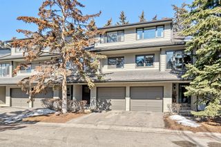 Photo 2: 11 140 Point Drive NW in Calgary: Point McKay Row/Townhouse for sale : MLS®# A2033887