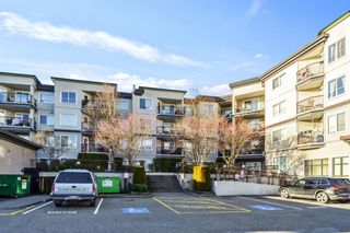 Photo 1: 308 5765 GLOVER Road in Langley: Langley City Condo for sale in "College Court" : MLS®# R2755351