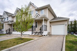 Photo 1: 217 950 Arbour Lake Road NW in Calgary: Arbour Lake Row/Townhouse for sale : MLS®# A1220896