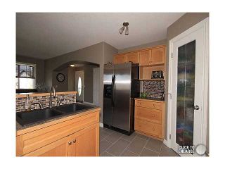 Photo 6: 60 CANOE Cove SW: Airdrie Residential Detached Single Family for sale : MLS®# C3517136