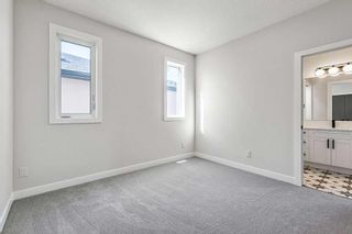 Photo 29: 418 24 Avenue NE in Calgary: Winston Heights/Mountview Semi Detached (Half Duplex) for sale : MLS®# A2126433