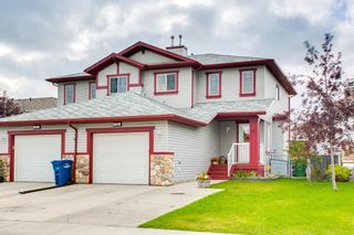 Photo 1: 560 Stonegate Way NW: Airdrie Semi Detached for sale : MLS®# A1220497