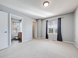 Photo 26: 123 Toscana Gardens NW in Calgary: Tuscany Row/Townhouse for sale : MLS®# A1217393