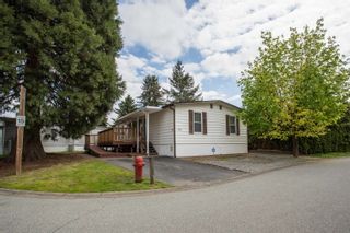 Photo 1: 70 145 KING EDWARD Street in Coquitlam: Maillardville Manufactured Home for sale in "MILL CREEK VILLAGE" : MLS®# R2776469