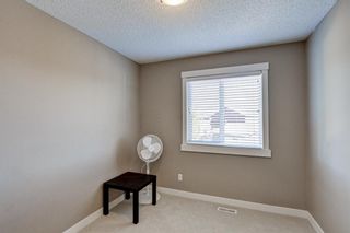 Photo 29: 179 Fireside Parkway: Cochrane Row/Townhouse for sale : MLS®# A1259498