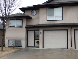 Photo 1: 31 103 FAIRWAYS Drive NW: Airdrie Townhouse for sale : MLS®# C3611153