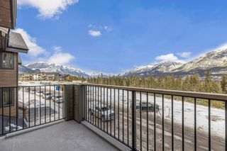 Photo 8: 18 209 Stewart Creek Rise: Canmore Row/Townhouse for sale : MLS®# A2032407