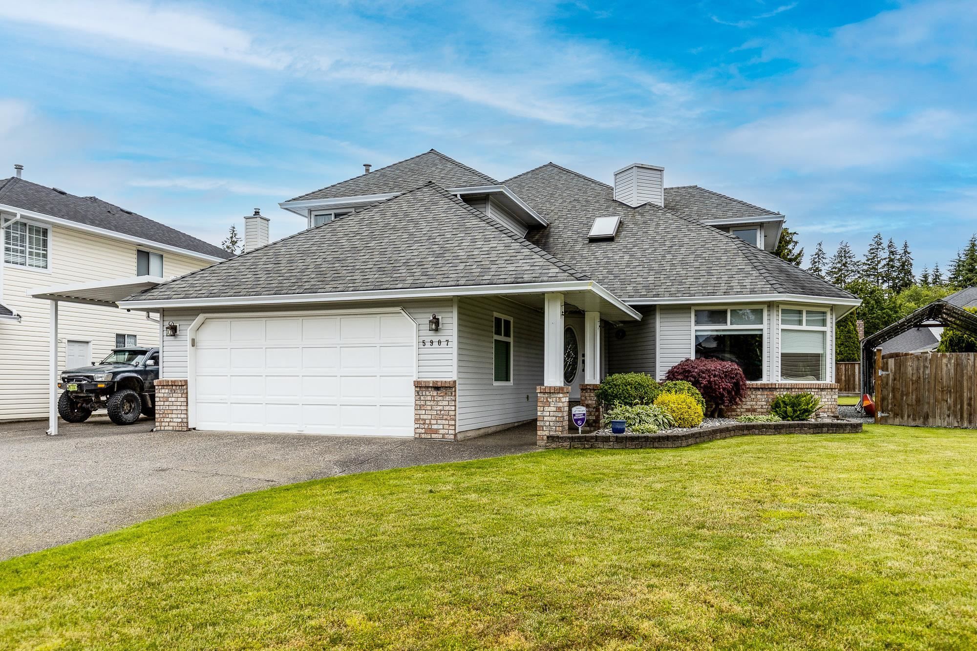 Main Photo: 5907 133A Street in Surrey: Panorama Ridge House for sale : MLS®# R2709161