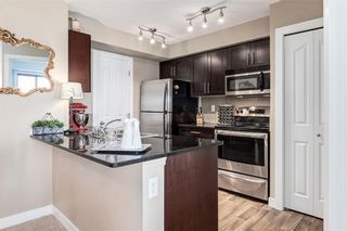 Photo 4: 4407 403 MACKENZIE Way SW: Airdrie Apartment for sale : MLS®# C4195055