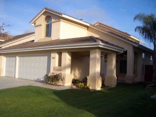 Photo 1: RANCHO PENASQUITOS Residential for sale : 4 bedrooms : 7405 Park Village Rd in San Diego