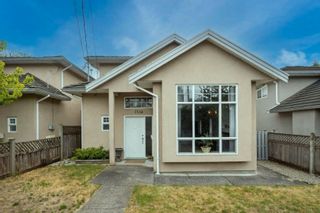 Photo 1: 7334 14TH Avenue in Burnaby: Edmonds BE 1/2 Duplex for sale (Burnaby East)  : MLS®# R2790906