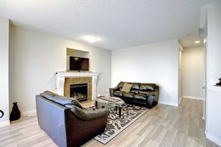 Photo 5: 242 Cougar Plateau Way SW in Calgary: Cougar Ridge Detached for sale : MLS®# A2007391