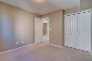 Photo 18: 9302 403 MACKENZIE Way SW: Airdrie Apartment for sale : MLS®# A1032027