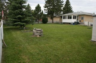 Photo 6: 1117 GREY Avenue: Crossfield Detached for sale : MLS®# A1099970